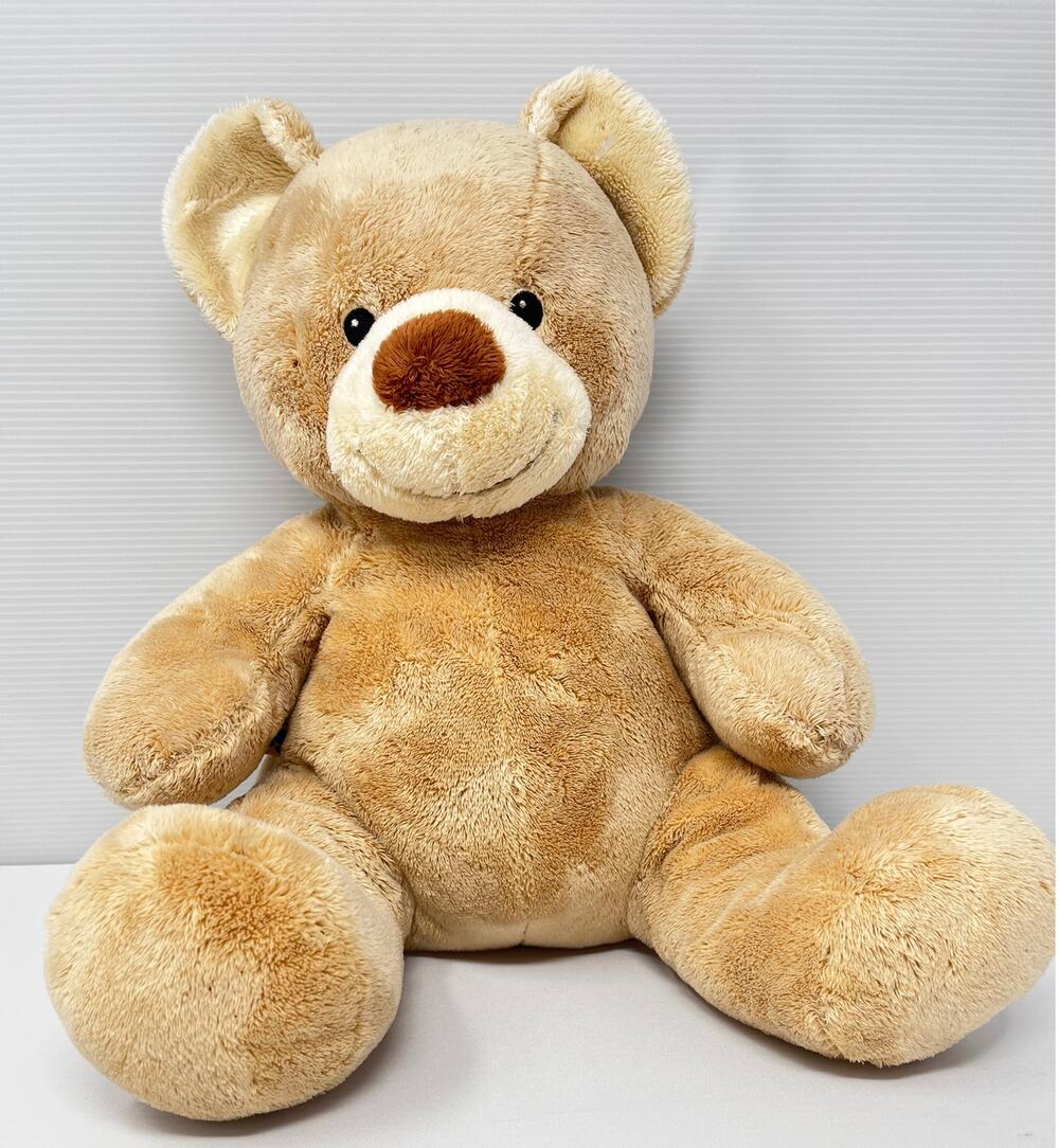 Light Brown Build A Bear Bear size Pre-Owned in good condition has a few stains